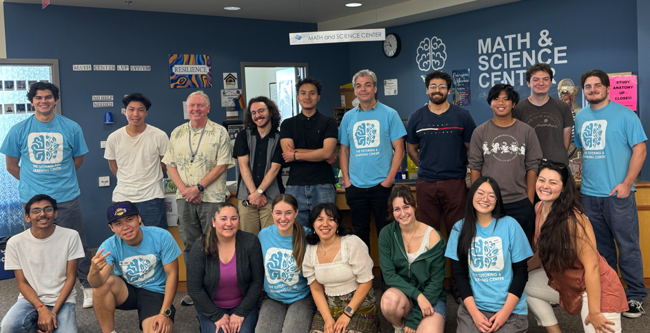 Photo of tutors in front of the Math and Science Center desk